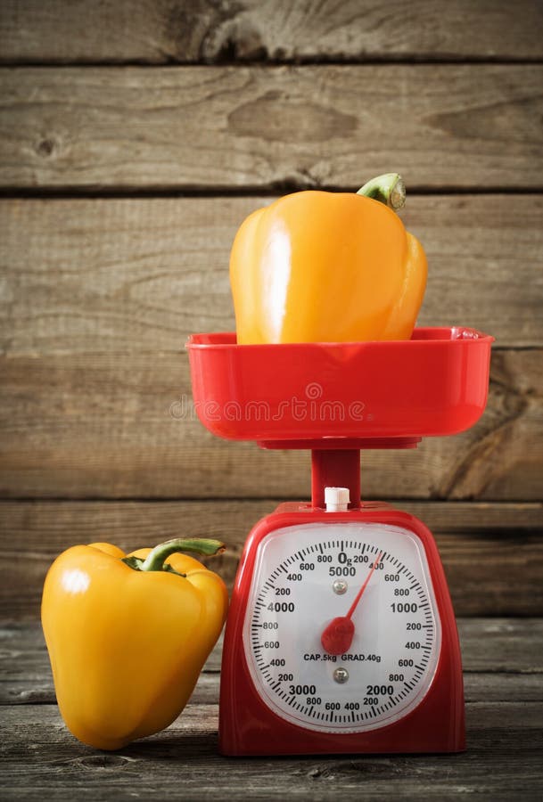 Pepper on Red Kitchen Scales Stock Photo Image of group, pepper