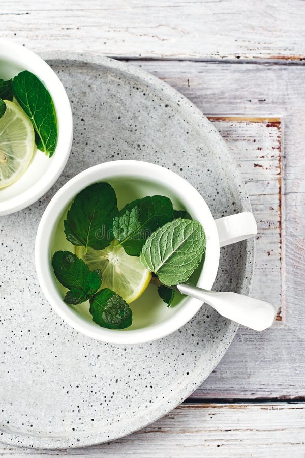 Peppermint tea with lemon stock image. Image of rustic 183885277