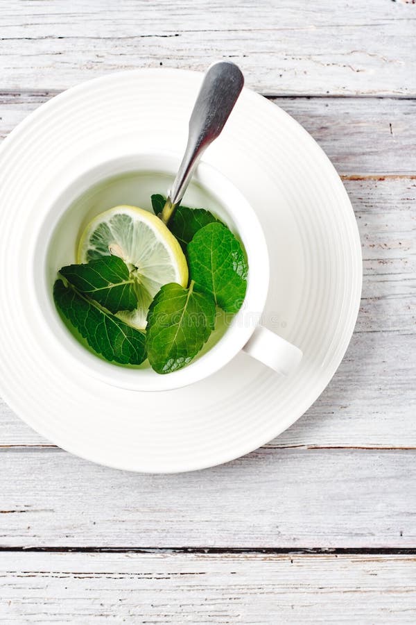 Peppermint tea with lemon stock image. Image of rustic 183885277