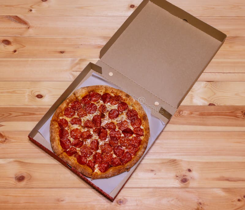 Pepperoni Pizza in Box on Wooden Table Stock Image Image of wooden