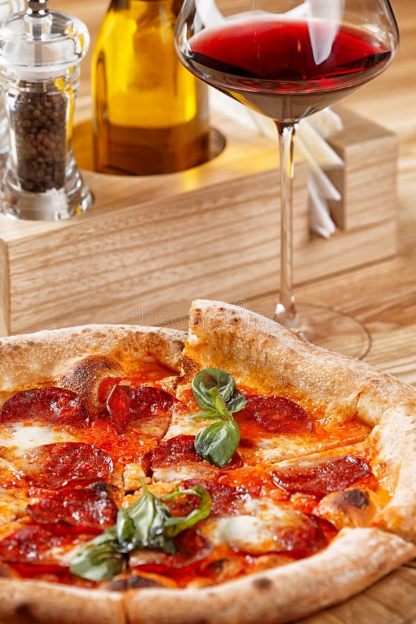 Pepperoni Pizza and a Glass of Wine Stock Image Image of background