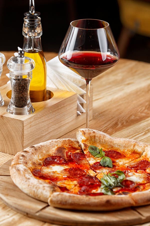 Pepperoni Pizza and a Glass of Wine Stock Image Image of background