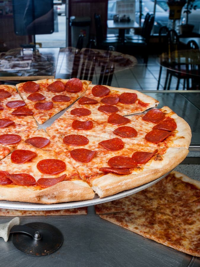 Image result for pepperoni pizza on a stand