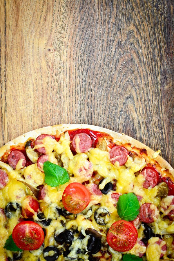 Pepperoni Pizza with Sausage, Cheese, Mozzarella, Olives and Bas Stock