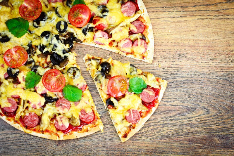 Pepperoni Pizza with Sausage, Cheese, Mozzarella, Olives and Bas Stock