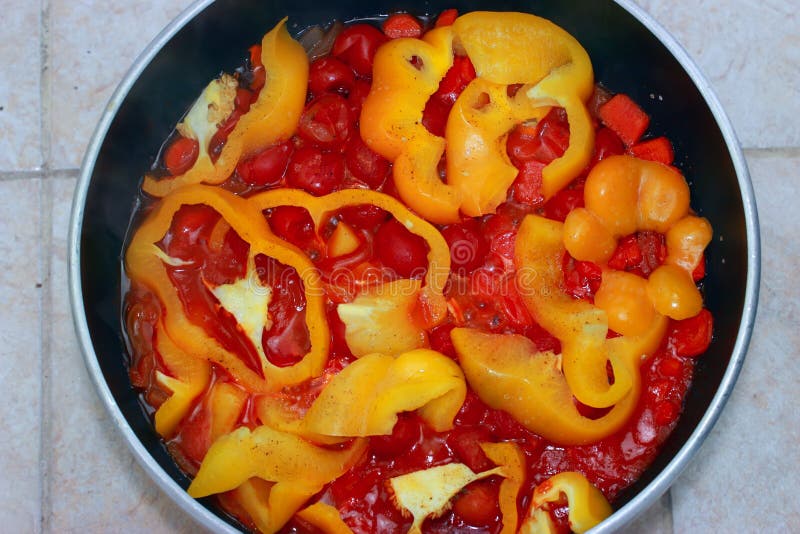 Peppers cooking stock image. Image of frying, cooking 27471513