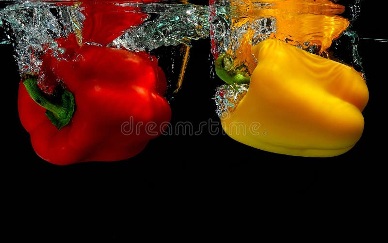 Peppers falling into water