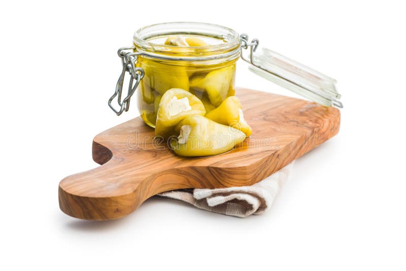 Peppers Stuffed with Cream Cheese in Jar Isolated on White Background