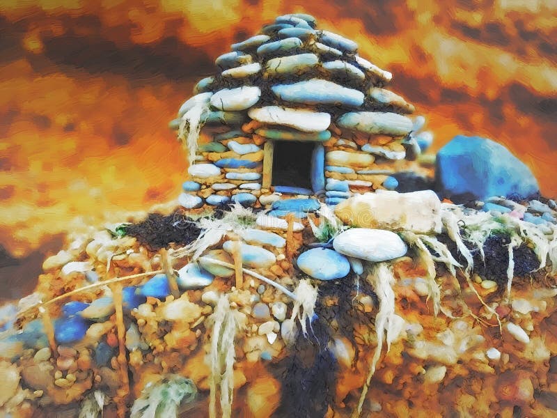 Pequeña casa de piedra junto al mar miniatura fotos de archivo libres de regalías