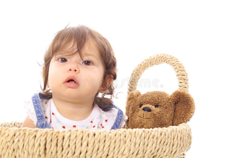 Shot of a little asian baby in basket. Shot of a little asian baby in basket