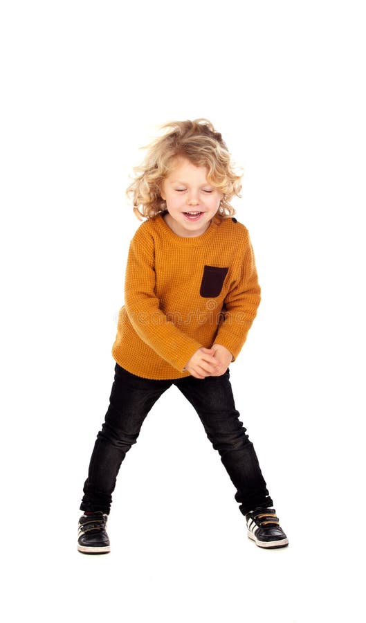 Pequeño jersey rubio feliz del amarillo del whith del niño fotografía de archivo libre de regalías Pequeño jersey rubio feliz del amarillo del whith del niño fotografía de archivo libre de regalías