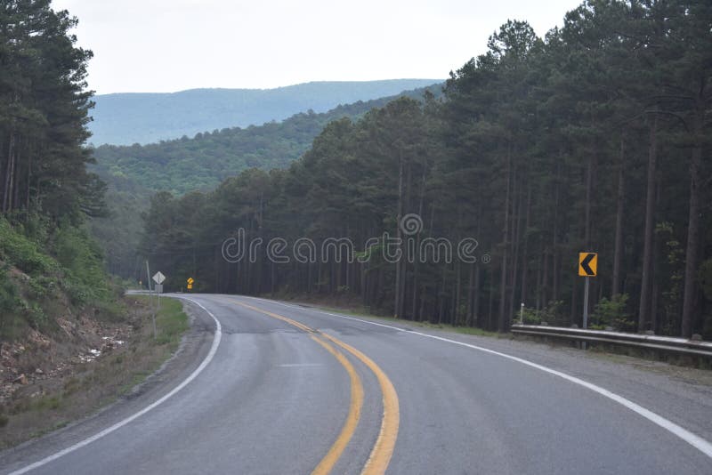 This is Hwy 259 headed South toward Beavers Bend in Oklahoma. Eastern Oklahoma and Western Arkansas has some great Country for a great getaway drive. This is Hwy 259 headed South toward Beavers Bend in Oklahoma. Eastern Oklahoma and Western Arkansas has some great Country for a great getaway drive.