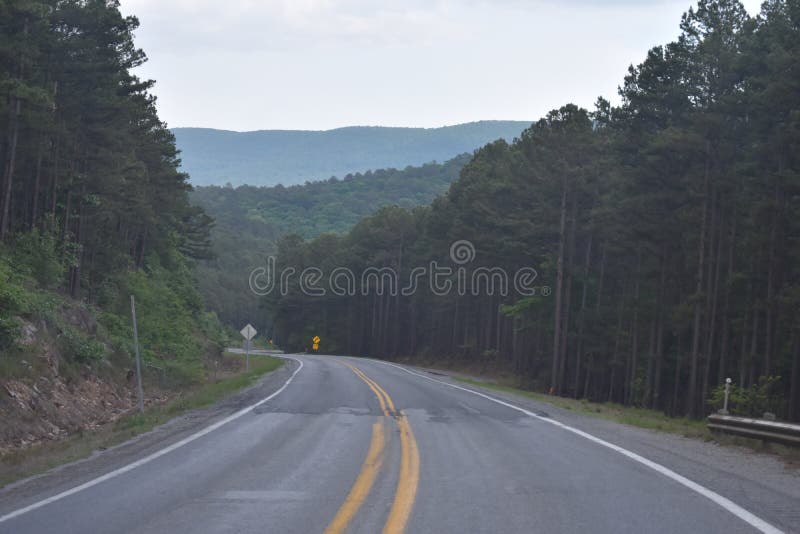 This is Hwy 259 headed South toward Beavers Bend in Oklahoma. Eastern Oklahoma and Western Arkansas has some great Country for a great getaway drive. This is Hwy 259 headed South toward Beavers Bend in Oklahoma. Eastern Oklahoma and Western Arkansas has some great Country for a great getaway drive.