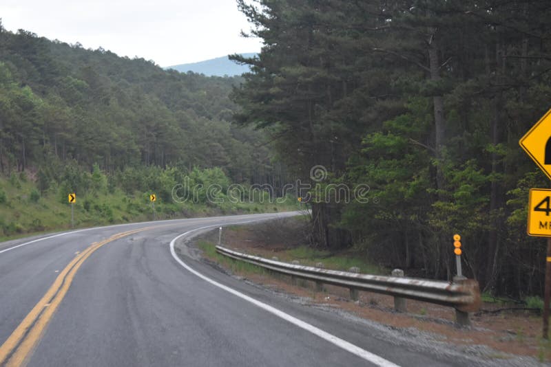 This is Hwy 259 headed South toward Beavers Bend in Oklahoma. Eastern Oklahoma and Western Arkansas has some great Country for a great getaway drive. This is Hwy 259 headed South toward Beavers Bend in Oklahoma. Eastern Oklahoma and Western Arkansas has some great Country for a great getaway drive.