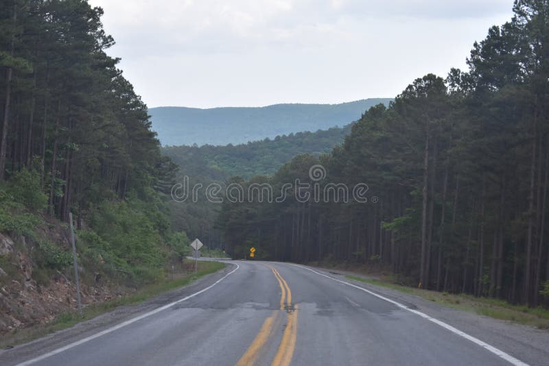 This is Hwy 259 headed South toward Beavers Bend in Oklahoma. Eastern Oklahoma and Western Arkansas has some great Country for a great getaway drive. This is Hwy 259 headed South toward Beavers Bend in Oklahoma. Eastern Oklahoma and Western Arkansas has some great Country for a great getaway drive.