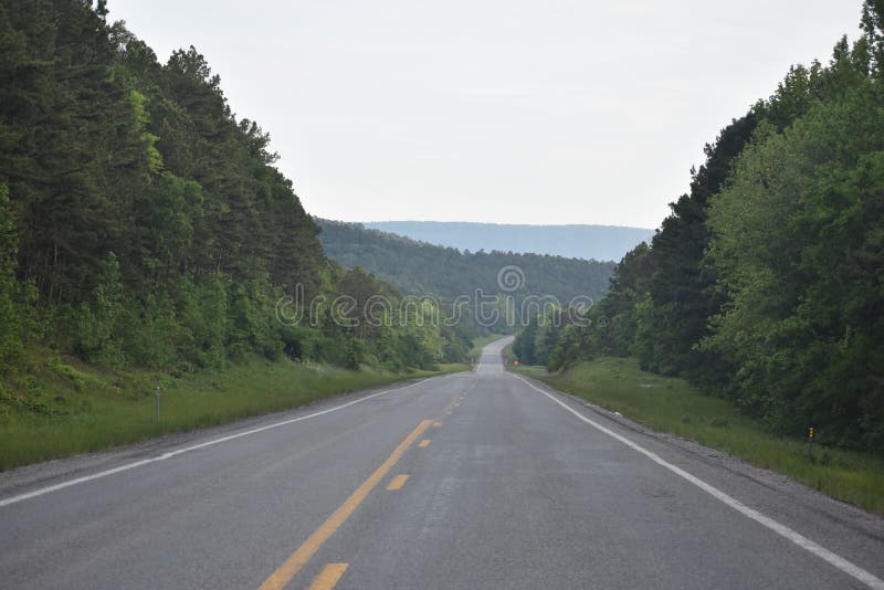 This is Hwy 259 headed South toward Beavers Bend in Oklahoma. Eastern Oklahoma and Western Arkansas has some great Country for a great getaway drive. This is Hwy 259 headed South toward Beavers Bend in Oklahoma. Eastern Oklahoma and Western Arkansas has some great Country for a great getaway drive.