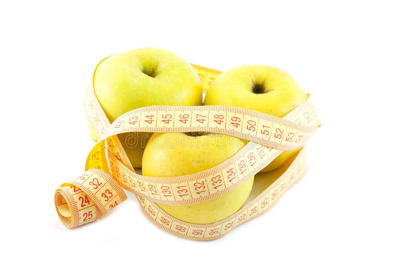 Green apple with measuring tape. Weight loss series. Green apple with measuring tape. Weight loss series.