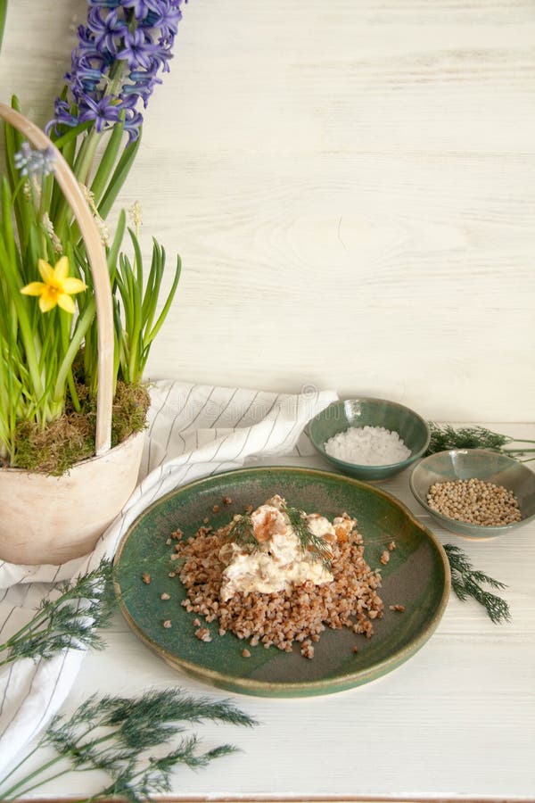 Buckwheat with mushrooms in sour cream sauce stock image Buckwheat with mushrooms in sour cream sauce stock image