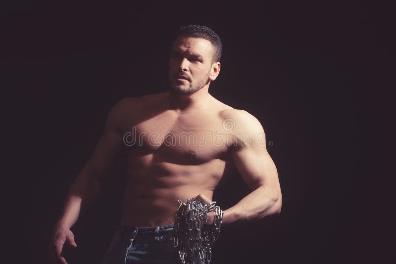 The Perfect Male Body , Awesome Bodybuilder Posing with a Chain. Stock Photo Image of chain