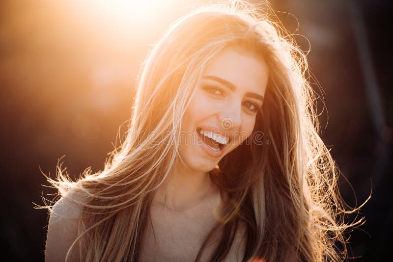 Perfect smile. Happy woman. Perfect smiling on sunny background. Beautiful model girl with perfect fresh clean skin royalty free stock images Perfect smile. Happy woman. Perfect smiling on sunny background. Beautiful model girl with perfect fresh clean skin royalty free stock images