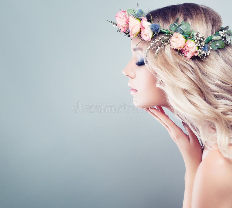 Perfect Young Woman with Spring Flowers