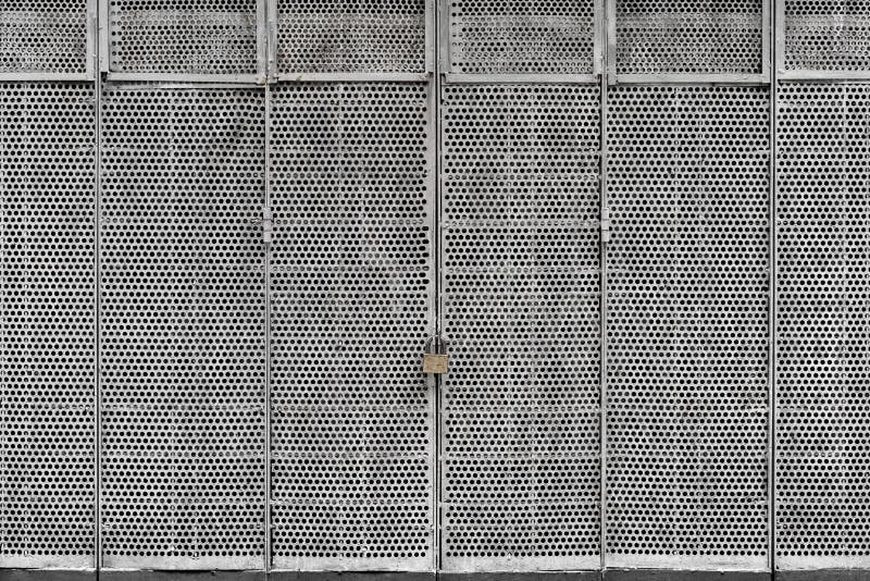 Perforated Metal Gate stock photo. Image of hinged, gray 78830242
