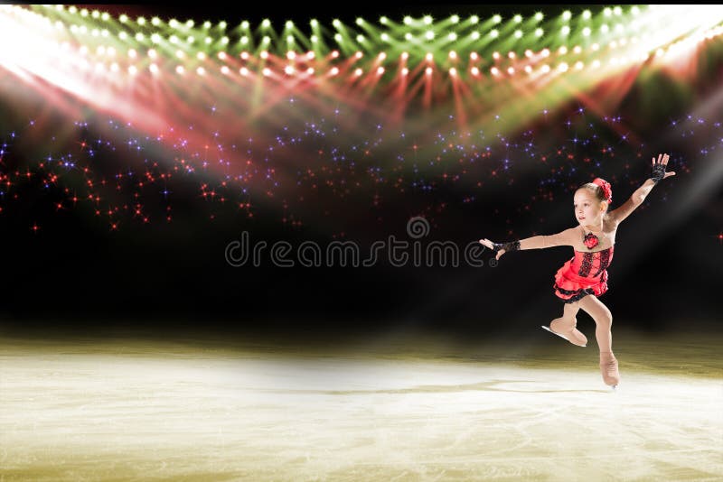 Young skater performs on the ice in the background lights lighting. Young skater performs on the ice in the background lights lighting