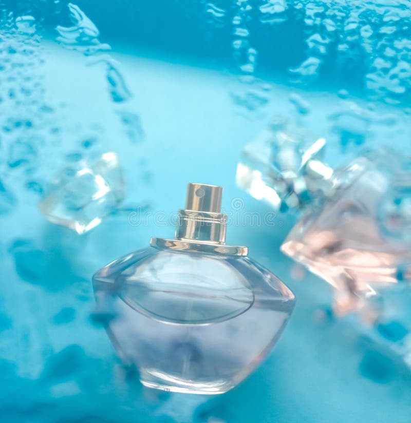 Perfume bottle under blue water, fresh sea coastal scent as glamour fragrance and eau de parfum product as holiday gift, luxury. Perfumery, cosmetics and stock images Perfume bottle under blue water, fresh sea coastal scent as glamour fragrance and eau de parfum product as holiday gift, luxury. Perfumery, cosmetics and stock images