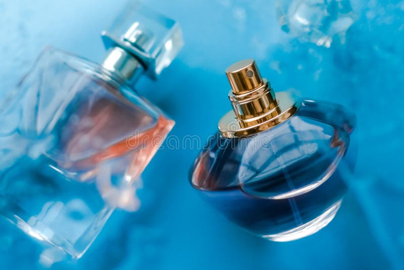Perfume bottle under blue water, fresh sea coastal scent as glamour fragrance and eau de parfum product as holiday gift, luxury. Perfumery, cosmetics and stock photos Perfume bottle under blue water, fresh sea coastal scent as glamour fragrance and eau de parfum product as holiday gift, luxury. Perfumery, cosmetics and stock photos
