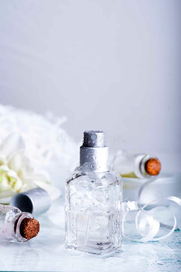 Perfume Bottles with Water Backgraund Stock Photo Image of horizontal