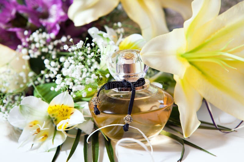 Perfume and flowers stock image. Image of holidays, married 31723967