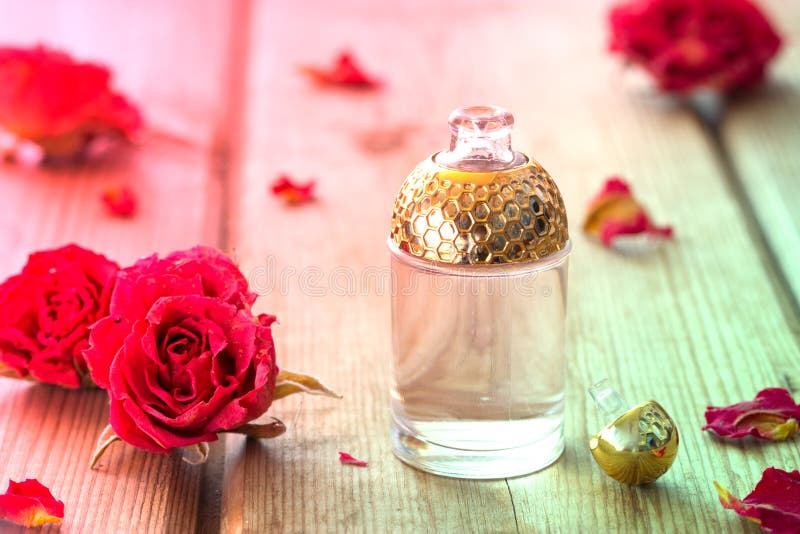 Perfume with roses stock image. Image of care, rose 165244641