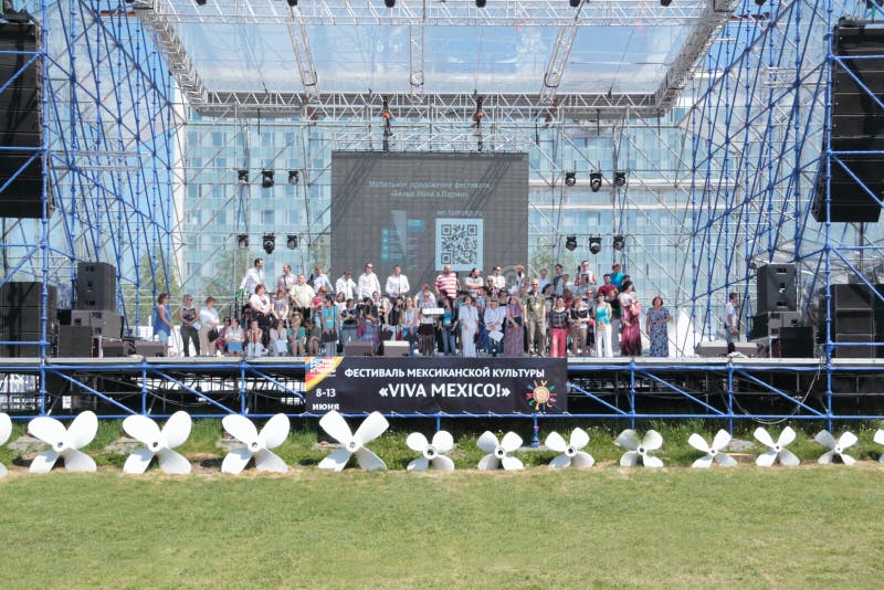 PERM, RUSSIA - JUN 11, 2013: Large group of people on main stage stock images PERM, RUSSIA - JUN 11, 2013: Large group of people on main stage stock images