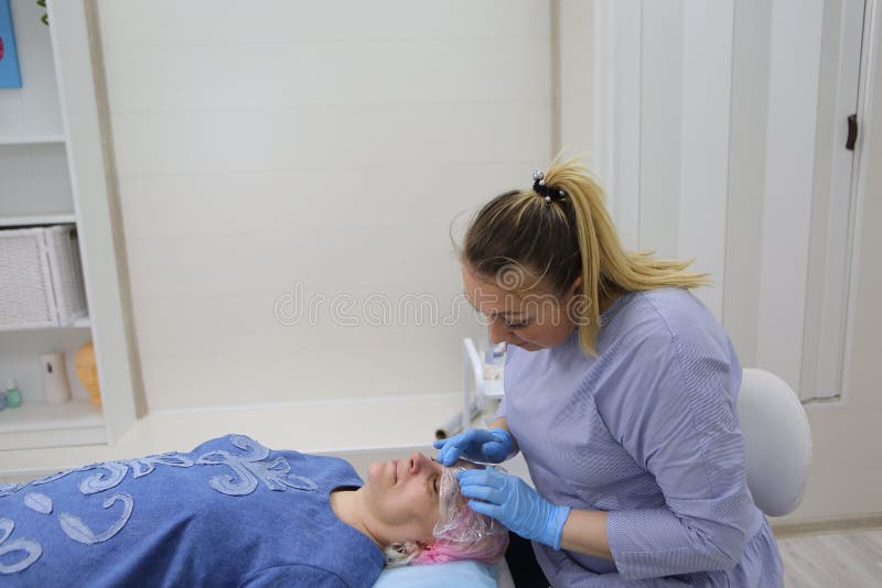 Permanent makeup. Permanent tattooing of eyebrows. stock photo Permanent makeup. Permanent tattooing of eyebrows. stock photo