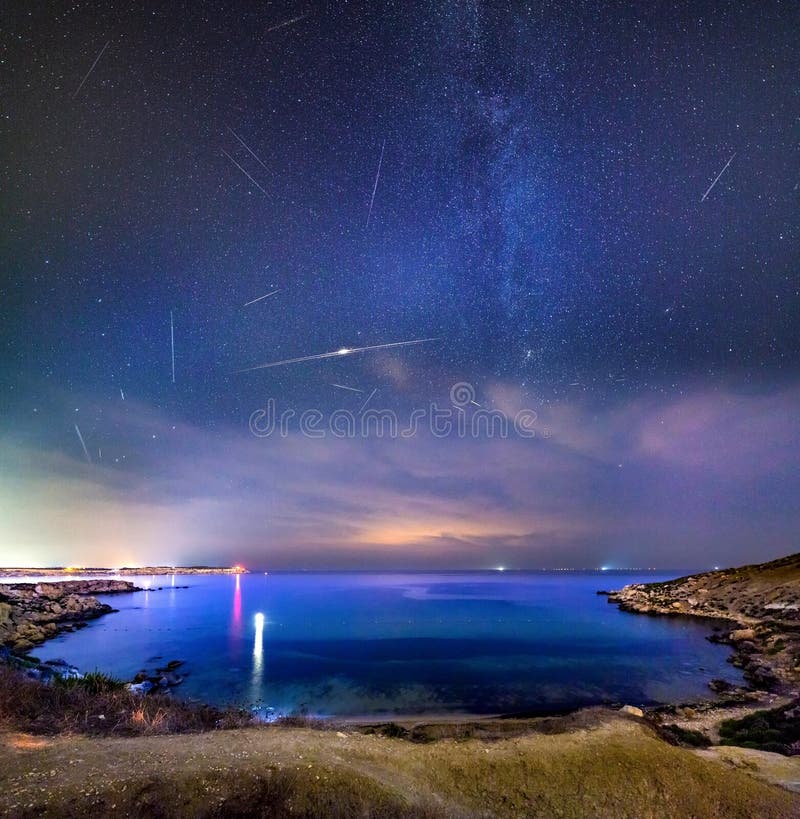 A sky full of shooting stars during the Perseid showers 2018 over Mgiebah Bay in Malta. A sky full of shooting stars during the Perseid showers 2018 over Mgiebah Bay in Malta