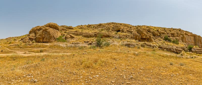 Hill and nature by the royal tombs ruins in old city Persepolis, a capital of the Achaemenid Empire 550 - 330 BC. Hill and nature by the royal tombs ruins in old city Persepolis, a capital of the Achaemenid Empire 550 - 330 BC.