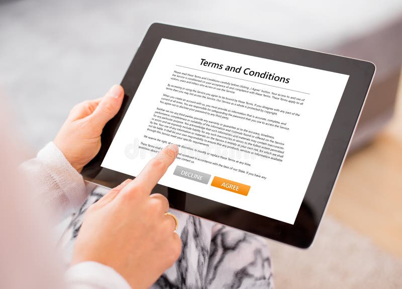 Person accepting terms and conditions on tablet