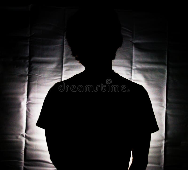A person in a black silhouette