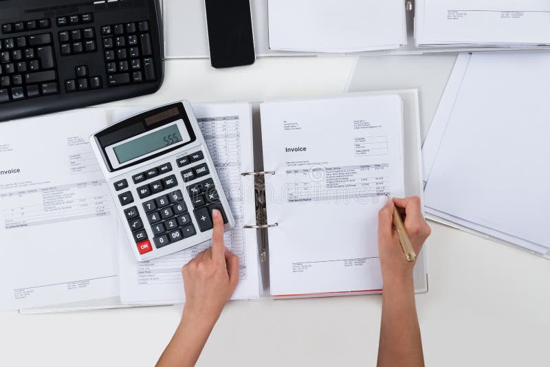 Person Calculating Receipts royalty free stock photo