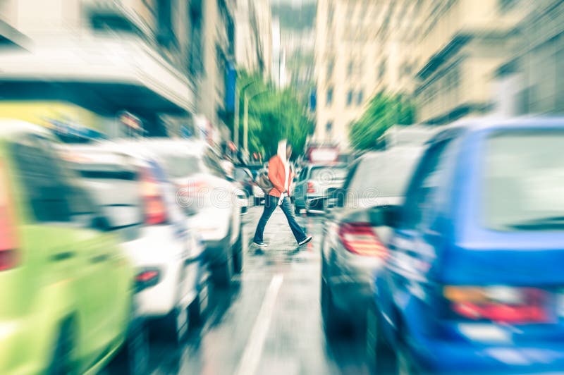 Person crossing the road during rush hour in Cape Town