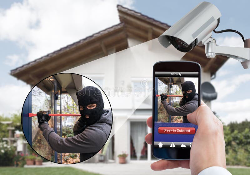 Person Hand Holding Mobile Phone, der Einbrecher ermittelt lizenzfreie stockbilder Person Hand Holding Mobile Phone, der Einbrecher ermittelt lizenzfreie stockbilder