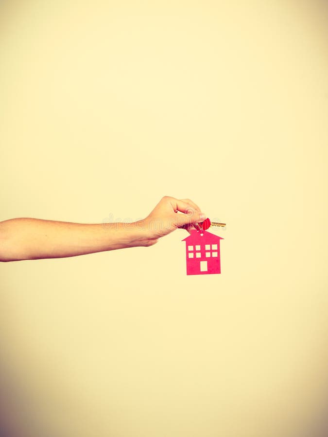 Person Holding Keys with Pendant in House Shape Stock Photo - Image of