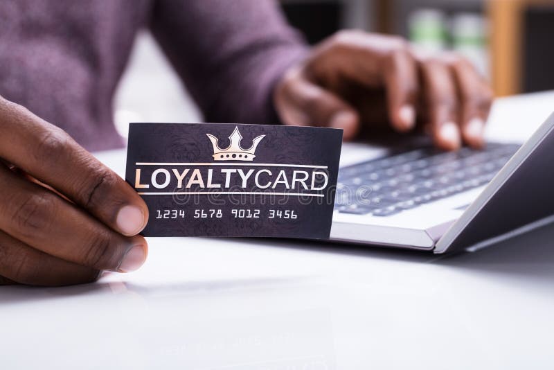 Person Holding Loyalty Card royalty free stock photography