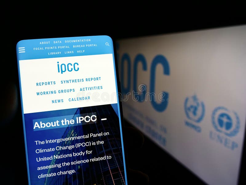 Person holding mobile phone with webpage of Intergovernmental Panel on Climate Change (IPCC) on screen with logo. royalty free stock photography