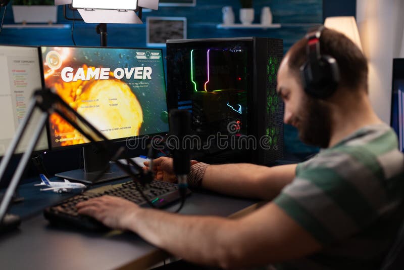 Premium Photo  Man feeling disapointed about losing video games on  computer. gamer with headphones using controller and playing online games  on monitor. sad player lost cyber game competition.