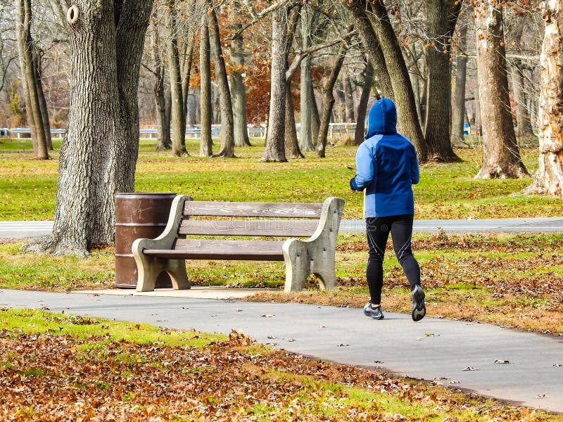 Person Running Through A Path In A Park stock photography
