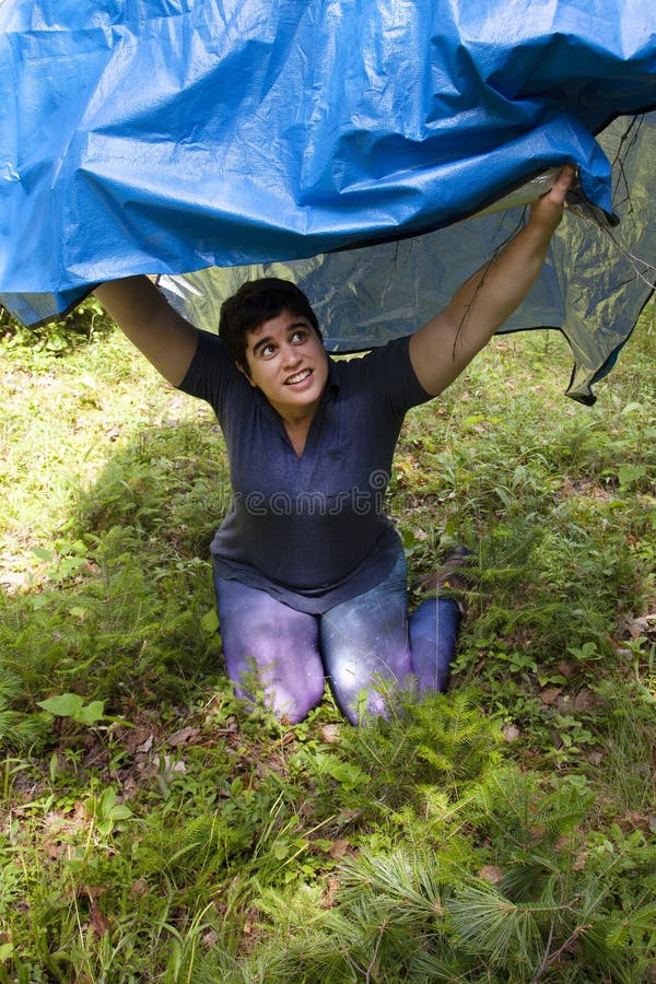 Shelter under a tarp royalty free stock image