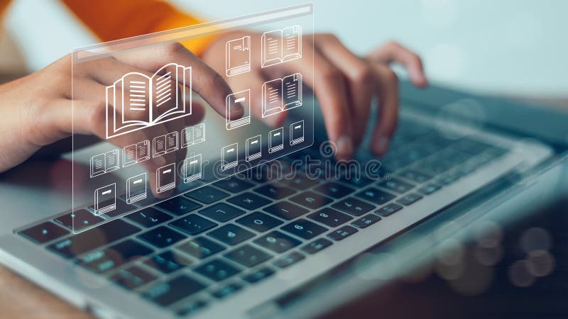 A person is typing on a laptop with a book icon on the screen. Concept of reading and learning, as the person is using the laptop stock photography