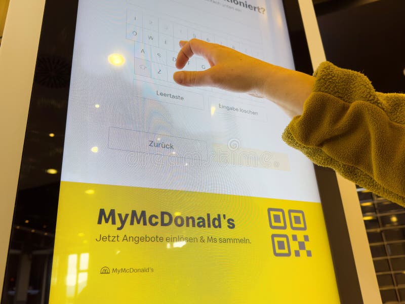 Person using fast food touchscreen menu at mcdonald\'s location stock images