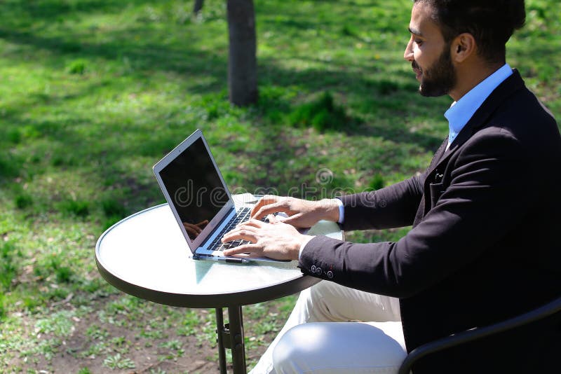 Journalist finished work in park royalty free stock photography